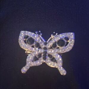 Elegant Silver and Black Butterfly Brooch